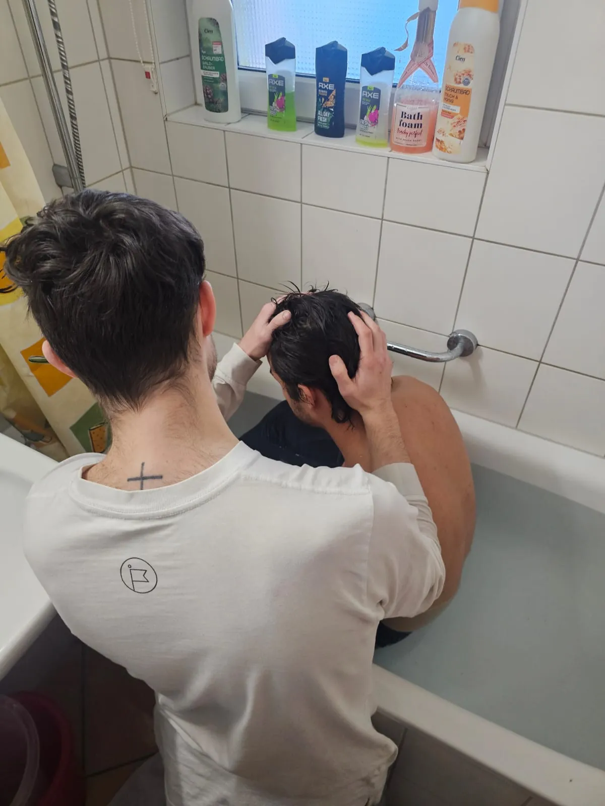 Taufe eines jungen Mannes